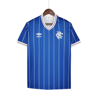 https://cdn.shopify.com/s/files/1/0826/7228/8075/files/19821983-glasgow-rangers-home-kit-classickits433-689095.webp?v=1741199181