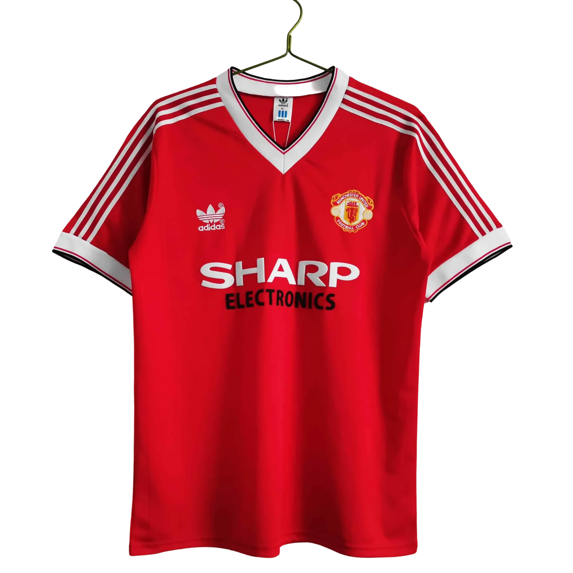 https://cdn.shopify.com/s/files/1/0826/7228/8075/files/1983-manchester-united-sharp-electronics-home-retro-kit-short-sleeves-classickits433-527905.webp?v=1741197621