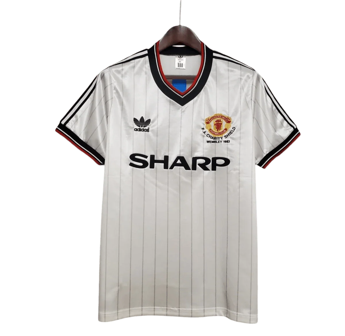 https://cdn.shopify.com/s/files/1/0826/7228/8075/files/19831984-manchester-united-sharp-fa-charity-shield-away-retro-kit-classickits433-249309.webp?v=1741199141