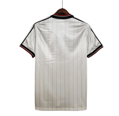 https://cdn.shopify.com/s/files/1/0826/7228/8075/files/19831984-manchester-united-sharp-fa-charity-shield-away-retro-kit-classickits433-414516.webp?v=1741199138