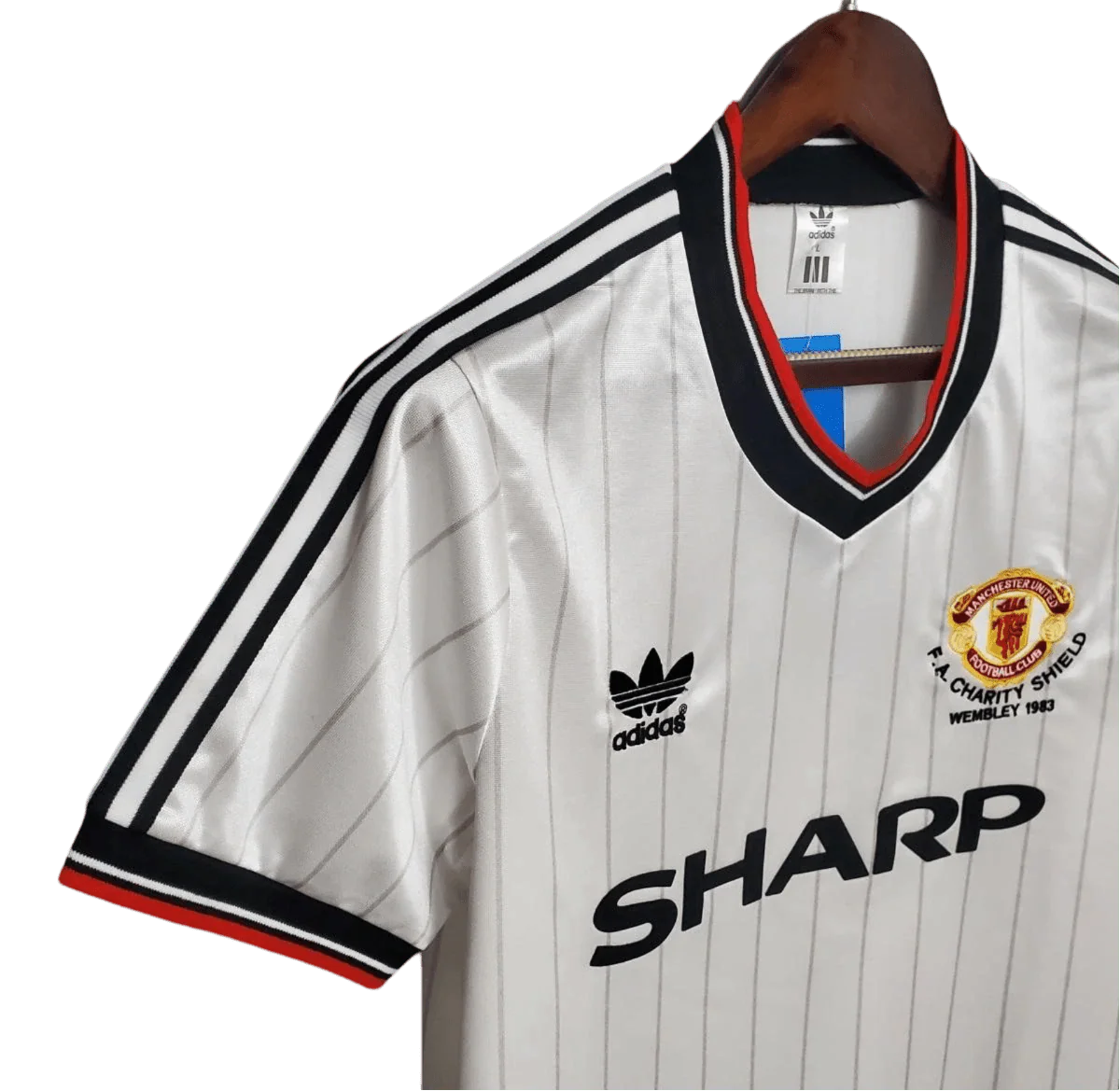 https://cdn.shopify.com/s/files/1/0826/7228/8075/files/19831984-manchester-united-sharp-fa-charity-shield-away-retro-kit-classickits433-861043.webp?v=1741199139