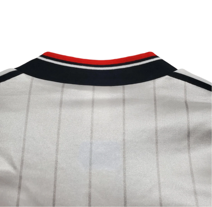 https://cdn.shopify.com/s/files/1/0826/7228/8075/files/19831984-manchester-united-sharp-fa-charity-shield-away-retro-kit-classickits433-984442.webp?v=1741199140