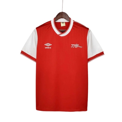 https://cdn.shopify.com/s/files/1/0826/7228/8075/files/19831986-arsenal-home-retro-kit-classickits433-207322.webp?v=1741199262