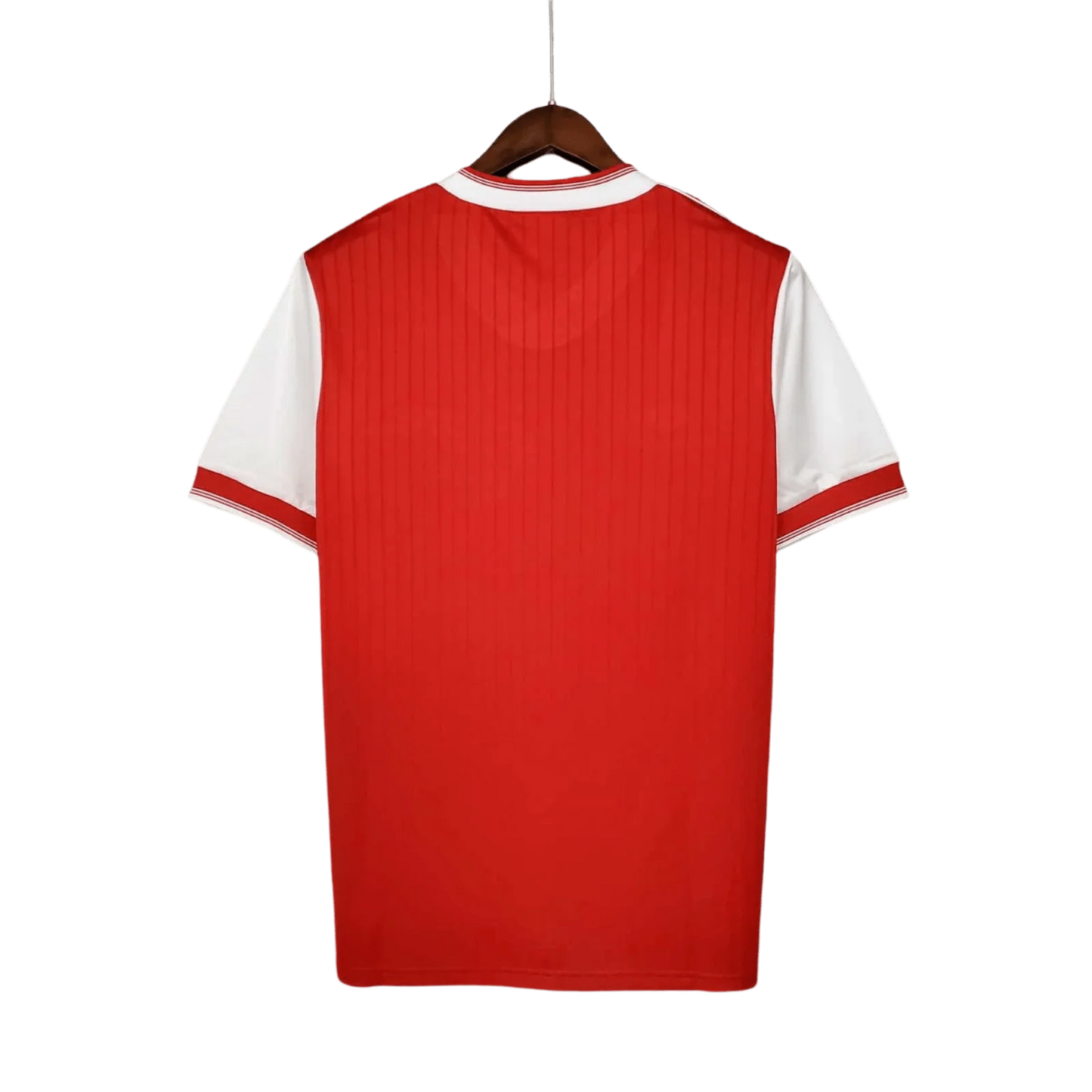 https://cdn.shopify.com/s/files/1/0826/7228/8075/files/19831986-arsenal-home-retro-kit-classickits433-609496.webp?v=1741199261