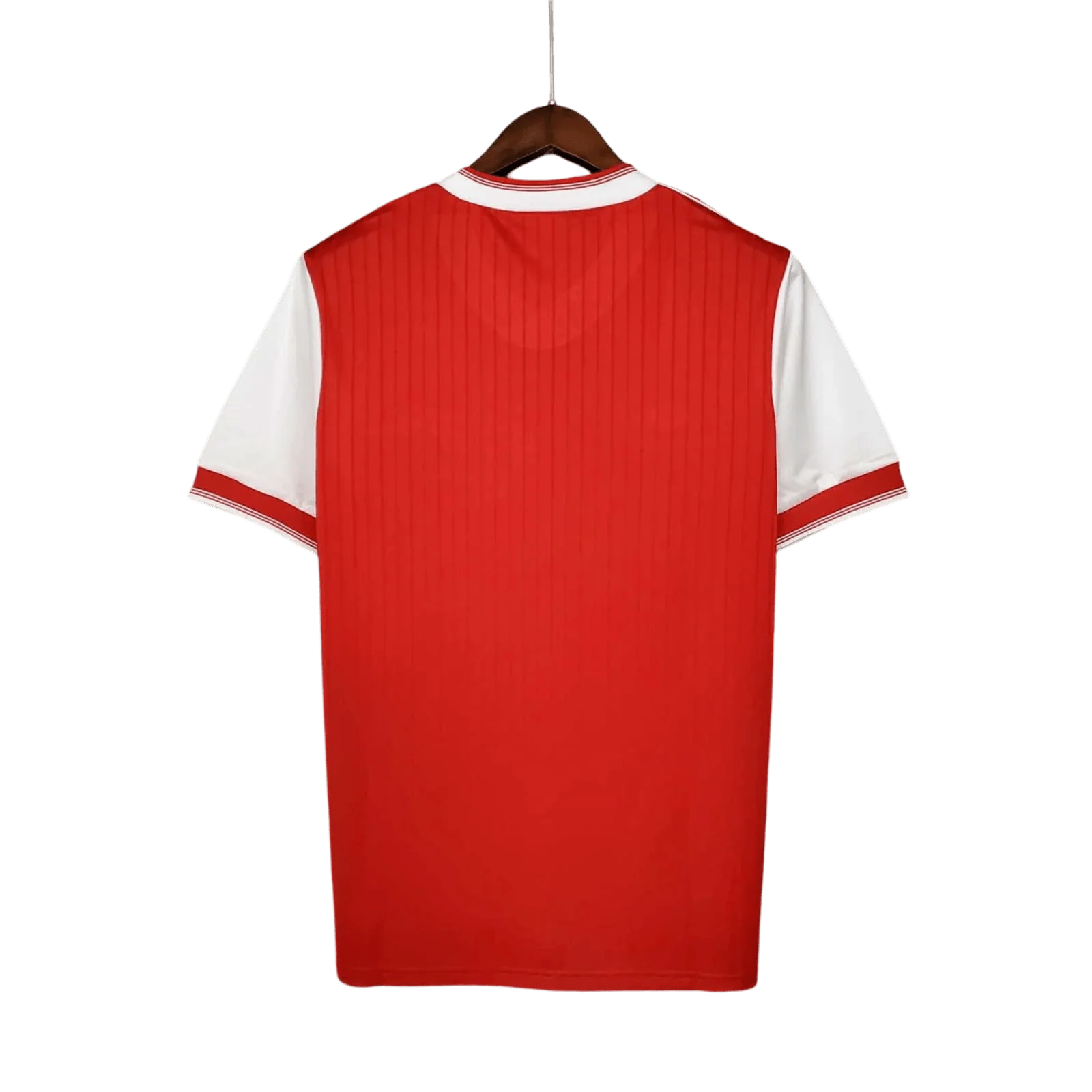 https://cdn.shopify.com/s/files/1/0826/7228/8075/files/19831986-arsenal-home-retro-kit-classickits433-609496.webp?v=1741199261