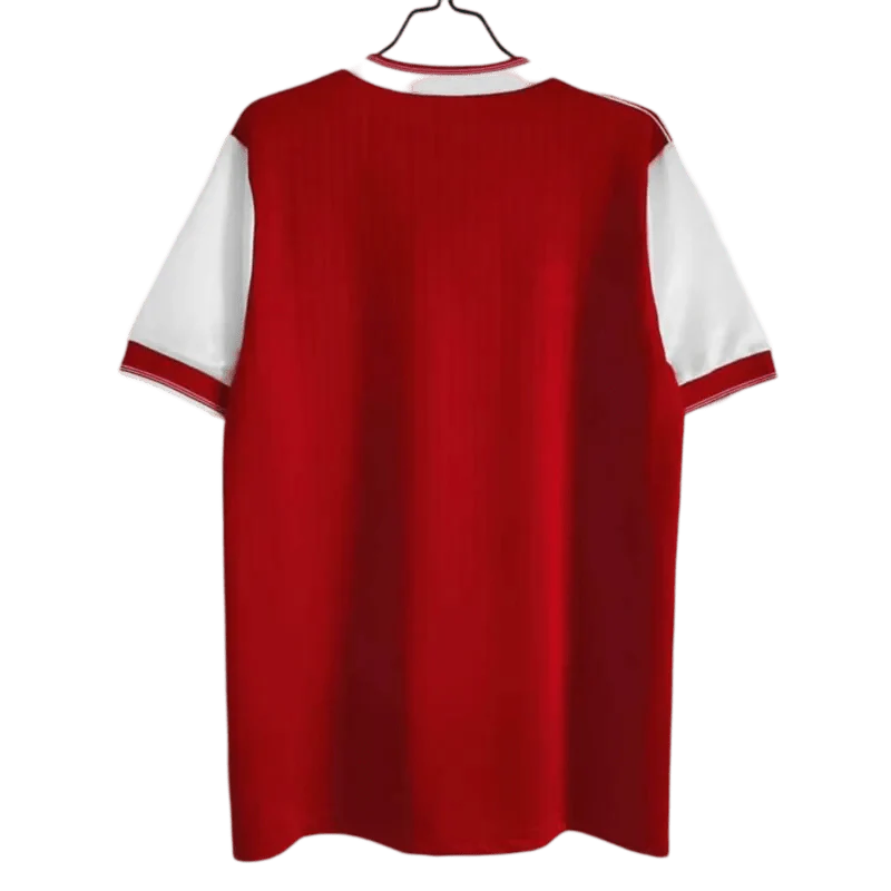 https://cdn.shopify.com/s/files/1/0826/7228/8075/files/19841985-arsenal-home-retro-kit-classickits433-855881.webp?v=1741198341