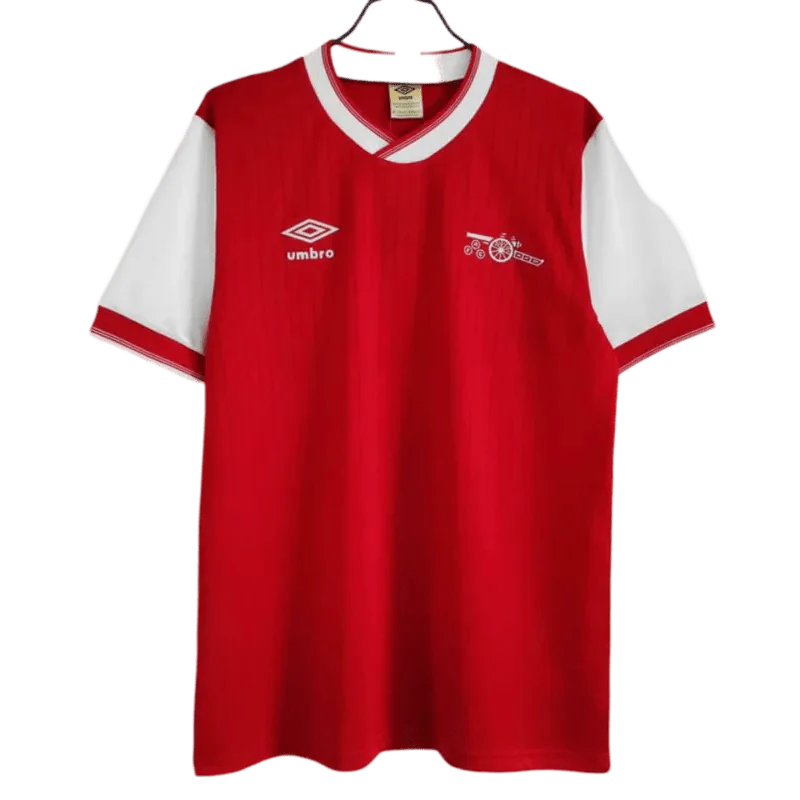 https://cdn.shopify.com/s/files/1/0826/7228/8075/files/19841985-arsenal-home-retro-kit-classickits433-865089.webp?v=1741198342