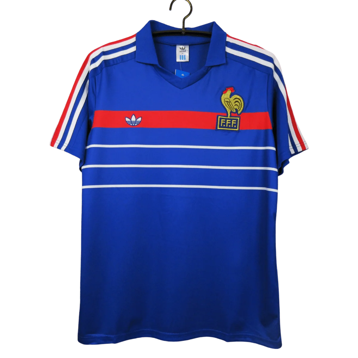https://cdn.shopify.com/s/files/1/0826/7228/8075/files/19841985-france-home-retro-jersey-385913.webp?v=1741198515