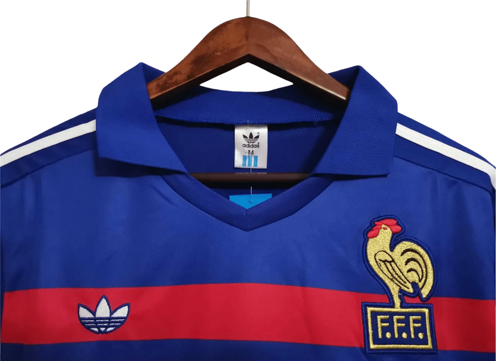 https://cdn.shopify.com/s/files/1/0826/7228/8075/files/19841985-france-home-retro-jersey-515147.webp?v=1741198514