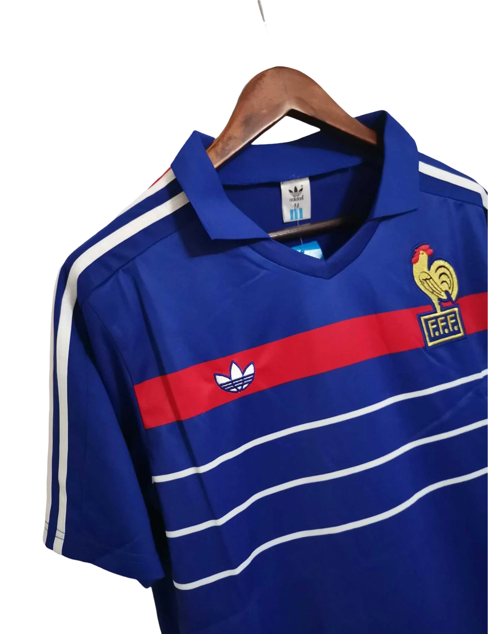 https://cdn.shopify.com/s/files/1/0826/7228/8075/files/19841985-france-home-retro-jersey-700529.webp?v=1741198514