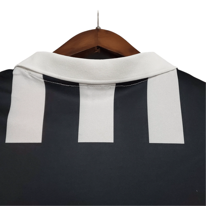 https://cdn.shopify.com/s/files/1/0826/7228/8075/files/19841985-juventus-ariston-home-retro-kit-classickits433-165737.webp?v=1741198817