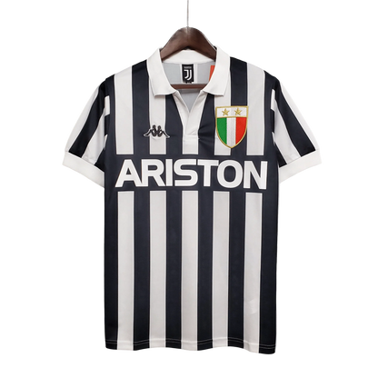 https://cdn.shopify.com/s/files/1/0826/7228/8075/files/19841985-juventus-ariston-home-retro-kit-classickits433-895955.webp?v=1741198813