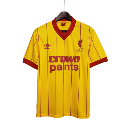 https://cdn.shopify.com/s/files/1/0826/7228/8075/files/19841985-liverpool-crown-paints-yellow-away-retro-kit-classickits433-824625.webp?v=1741199197