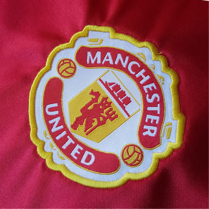 https://cdn.shopify.com/s/files/1/0826/7228/8075/files/19841986-manchester-united-sharp-home-retro-kit-classickits433-397145.webp?v=1741197616