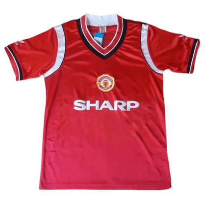 https://cdn.shopify.com/s/files/1/0826/7228/8075/files/19841986-manchester-united-sharp-home-retro-kit-classickits433-820701.webp?v=1741197613