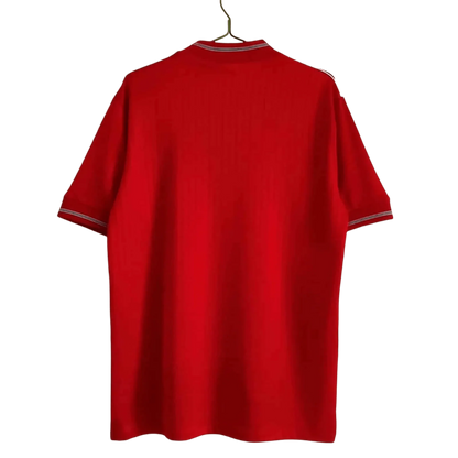 https://cdn.shopify.com/s/files/1/0826/7228/8075/files/19841987-england-away-red-retro-kit-630800.webp?v=1741196952