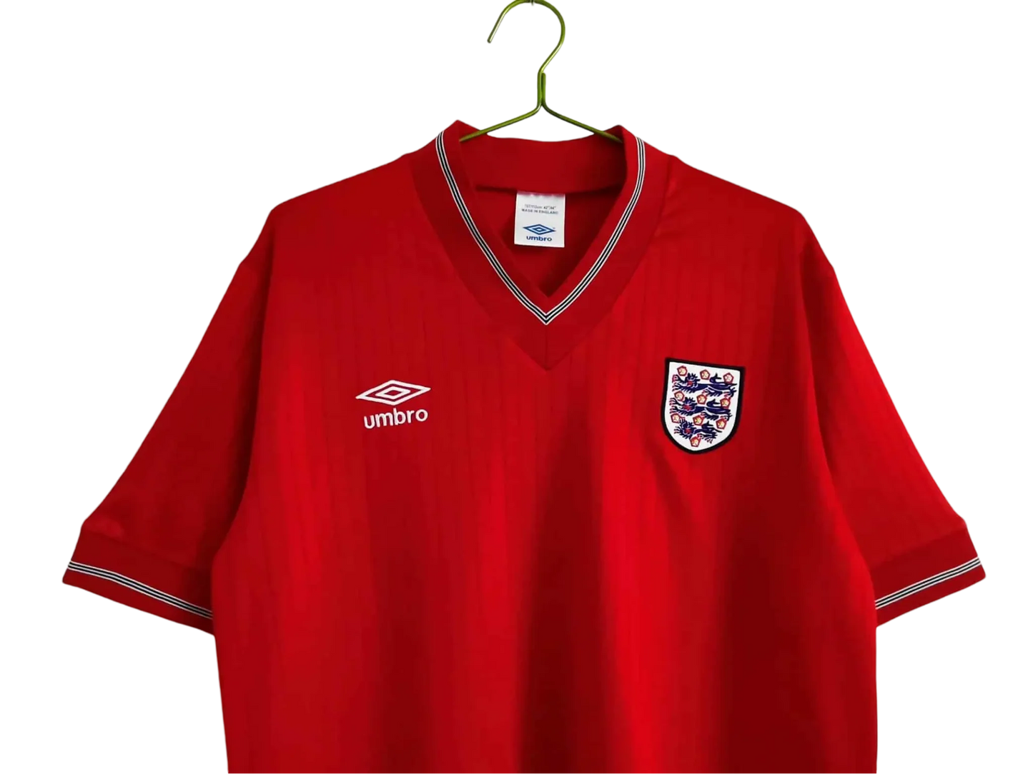 https://cdn.shopify.com/s/files/1/0826/7228/8075/files/19841987-england-away-red-retro-kit-939401.webp?v=1741196952