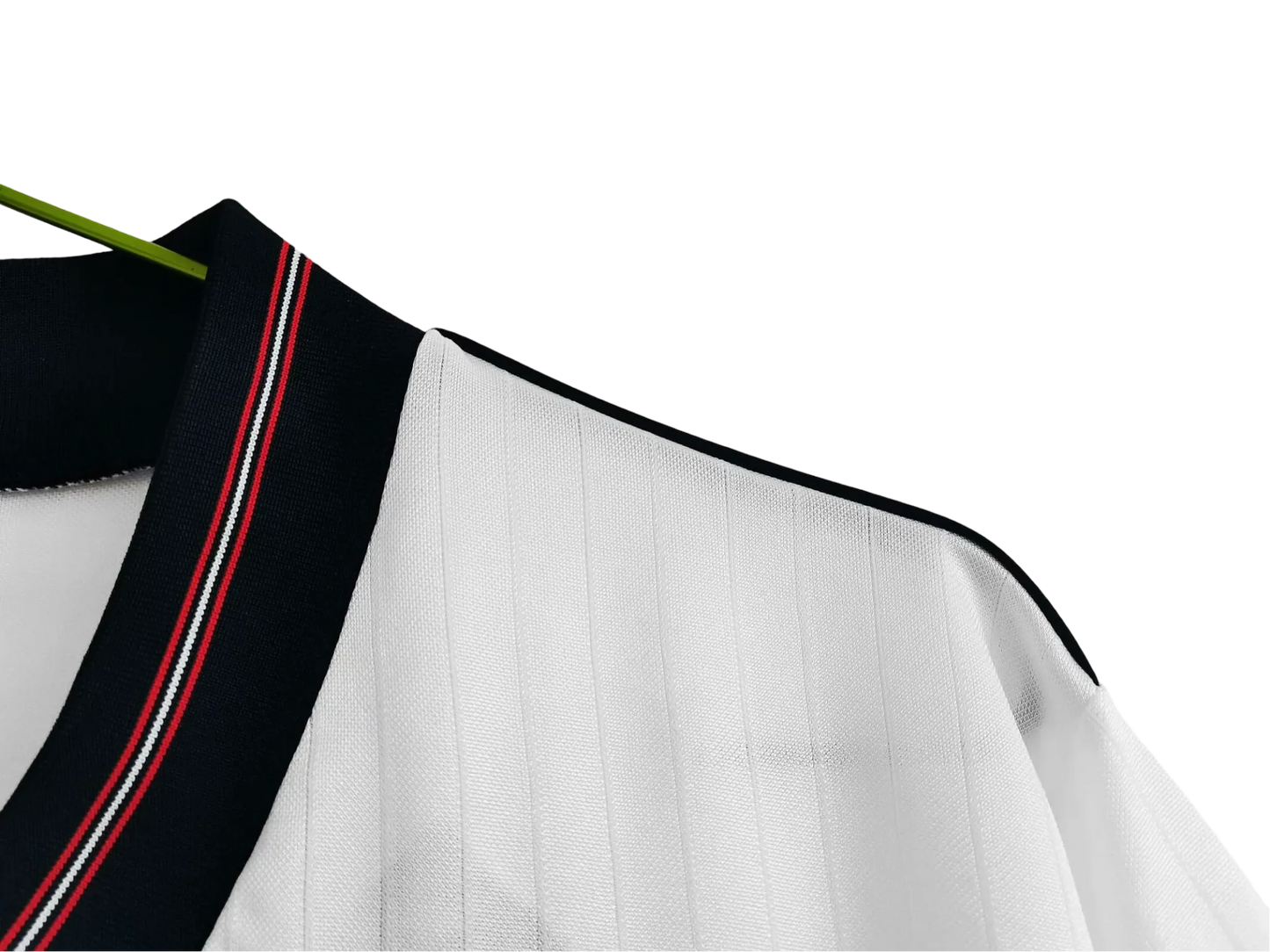 https://cdn.shopify.com/s/files/1/0826/7228/8075/files/19841987-england-home-retro-kit-691254.webp?v=1741196971