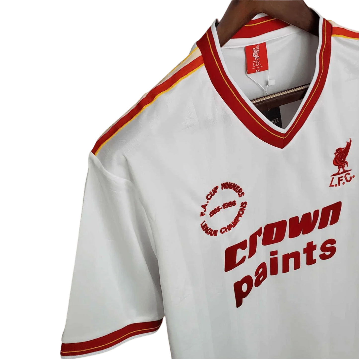 https://cdn.shopify.com/s/files/1/0826/7228/8075/files/19851986-liverpool-crown-paints-white-away-retro-kit-classickits433-231093.webp?v=1741199196