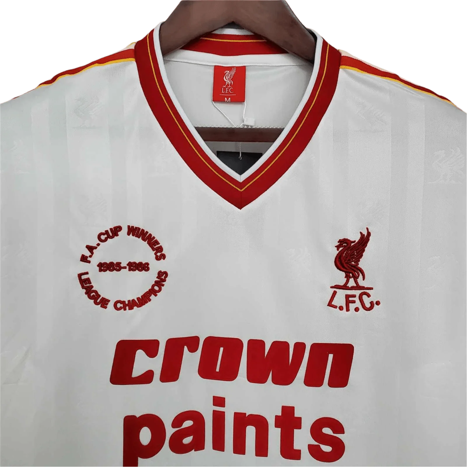 https://cdn.shopify.com/s/files/1/0826/7228/8075/files/19851986-liverpool-crown-paints-white-away-retro-kit-classickits433-666854.webp?v=1741199194