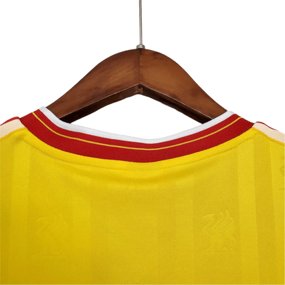 https://cdn.shopify.com/s/files/1/0826/7228/8075/files/19851986-liverpool-crown-paints-yellow-third-retro-kit-classickits433-150539.webp?v=1741197843