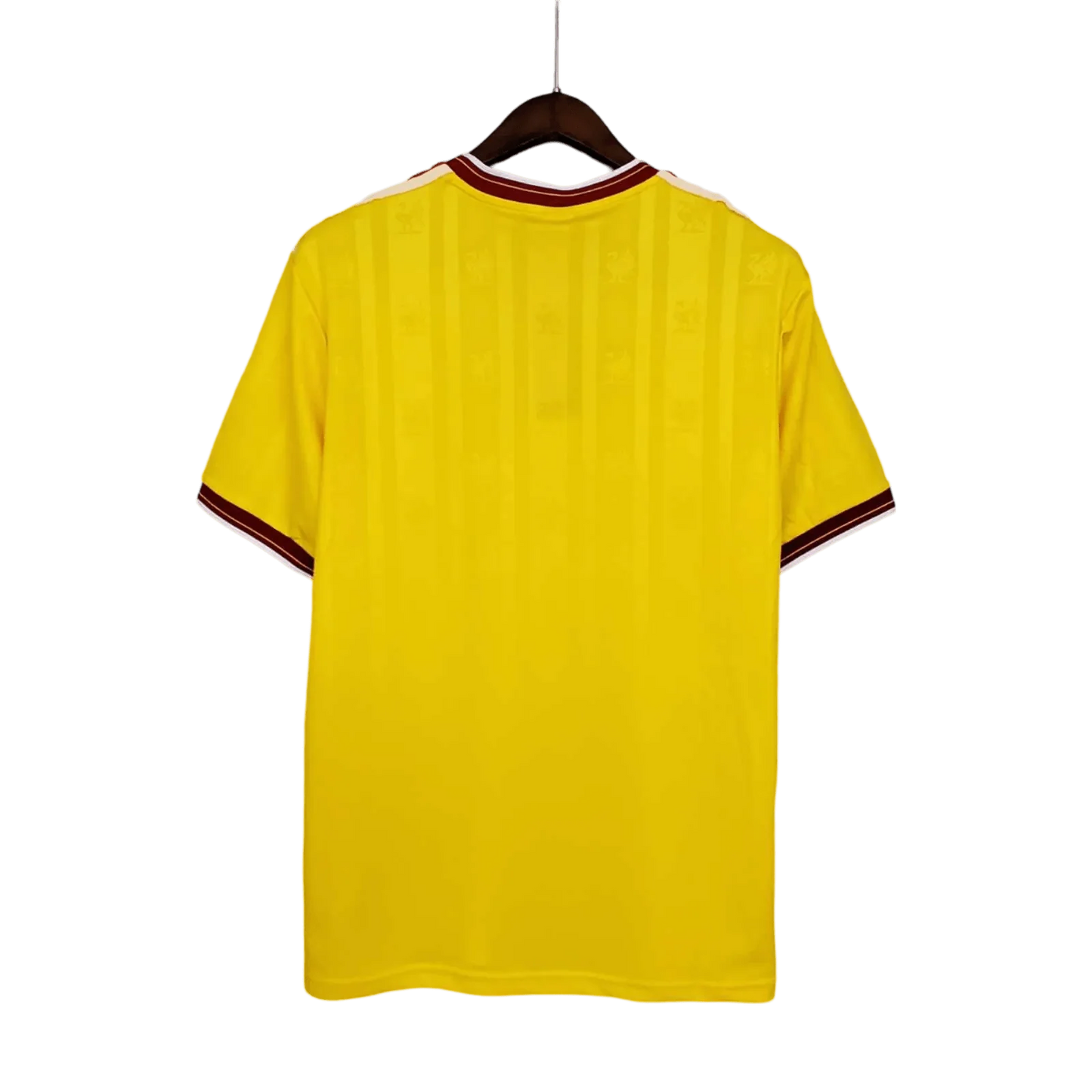 https://cdn.shopify.com/s/files/1/0826/7228/8075/files/19851986-liverpool-crown-paints-yellow-third-retro-kit-classickits433-252433.webp?v=1741197840