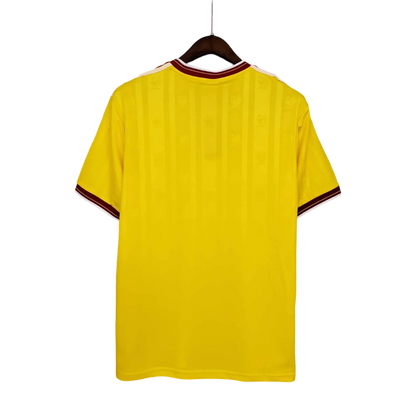 https://cdn.shopify.com/s/files/1/0826/7228/8075/files/19851986-liverpool-crown-paints-yellow-third-retro-kit-classickits433-252433.webp?v=1741197840
