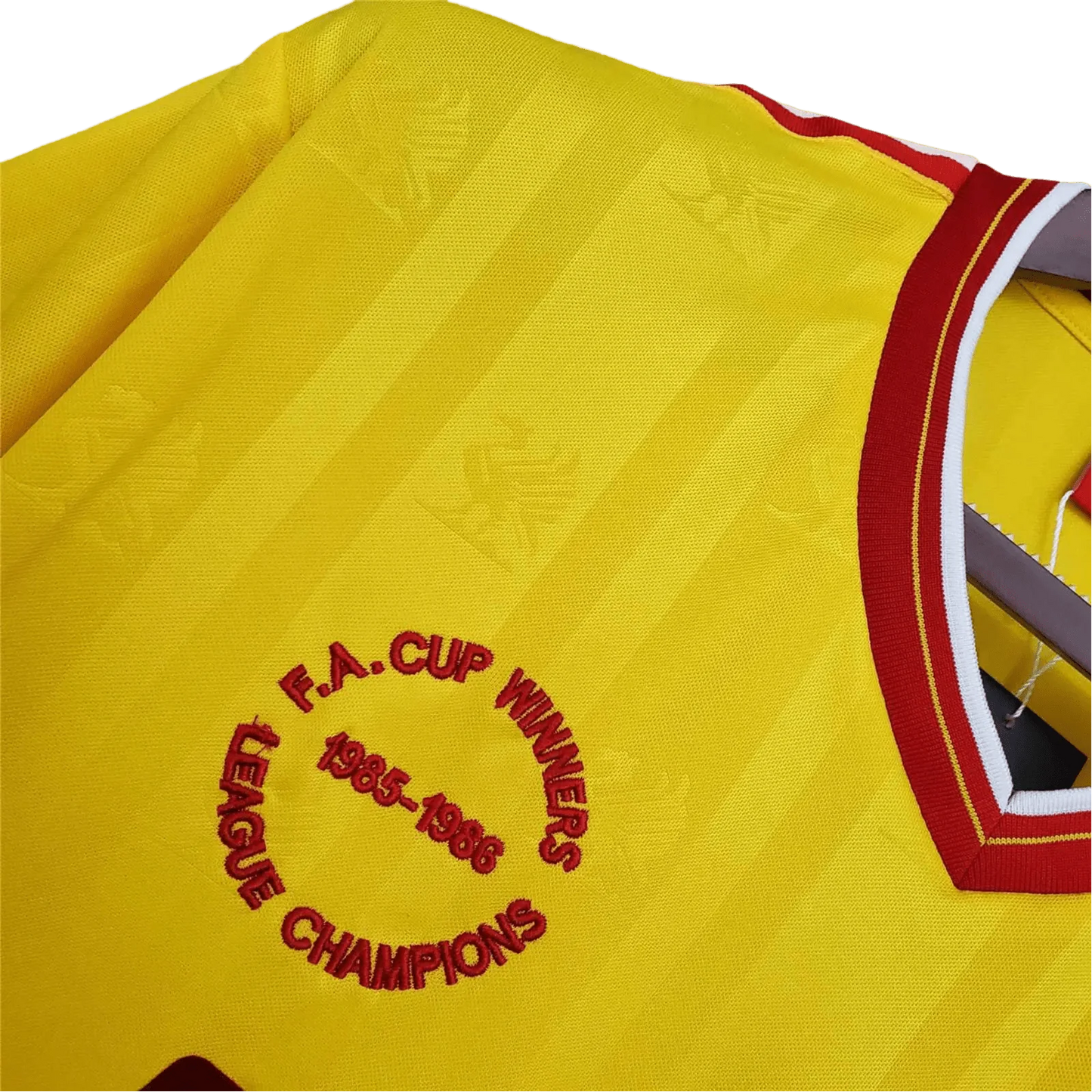 https://cdn.shopify.com/s/files/1/0826/7228/8075/files/19851986-liverpool-crown-paints-yellow-third-retro-kit-classickits433-389133.webp?v=1741197840