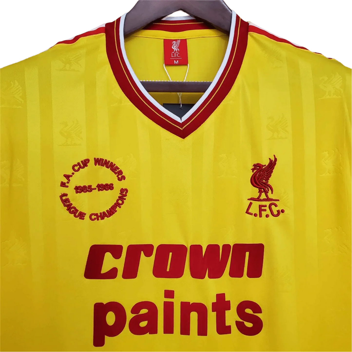 https://cdn.shopify.com/s/files/1/0826/7228/8075/files/19851986-liverpool-crown-paints-yellow-third-retro-kit-classickits433-561364.webp?v=1741197843