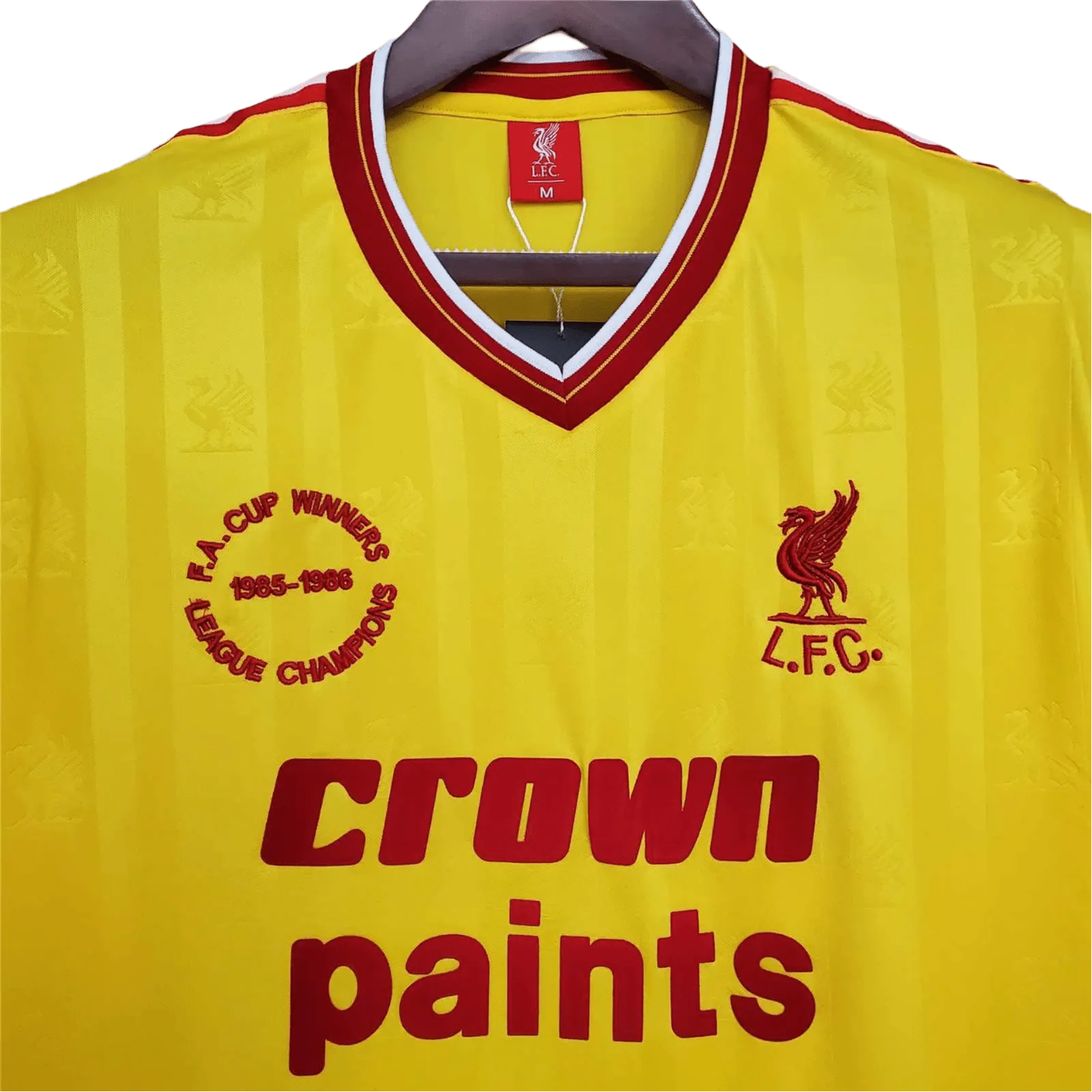 https://cdn.shopify.com/s/files/1/0826/7228/8075/files/19851986-liverpool-crown-paints-yellow-third-retro-kit-classickits433-561364.webp?v=1741197843