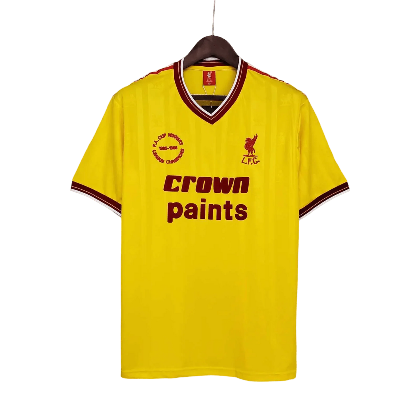 https://cdn.shopify.com/s/files/1/0826/7228/8075/files/19851986-liverpool-crown-paints-yellow-third-retro-kit-classickits433-712724.webp?v=1741197841