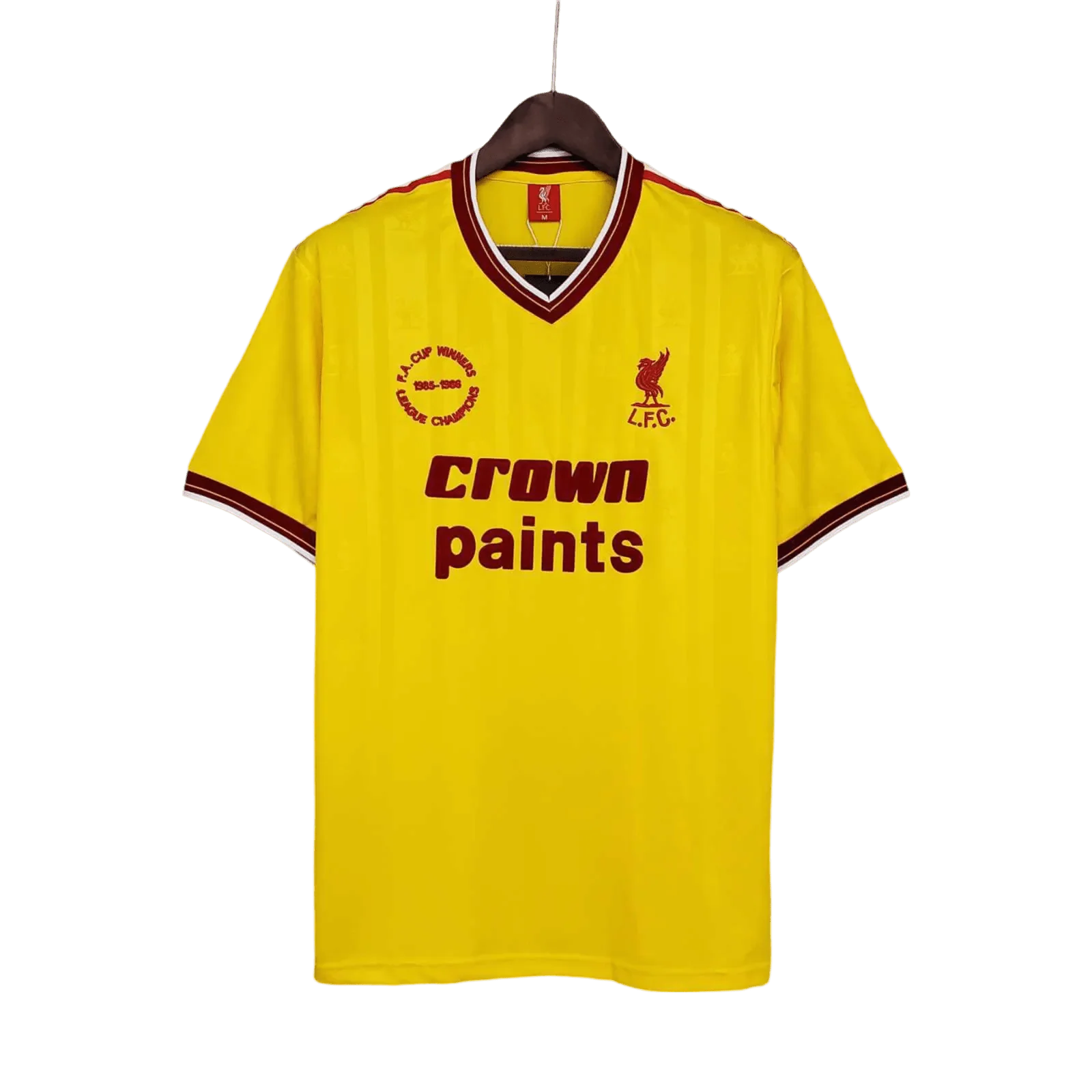https://cdn.shopify.com/s/files/1/0826/7228/8075/files/19851986-liverpool-crown-paints-yellow-third-retro-kit-classickits433-712724.webp?v=1741197841