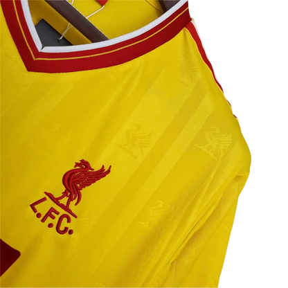 https://cdn.shopify.com/s/files/1/0826/7228/8075/files/19851986-liverpool-crown-paints-yellow-third-retro-kit-classickits433-832374.webp?v=1741197842