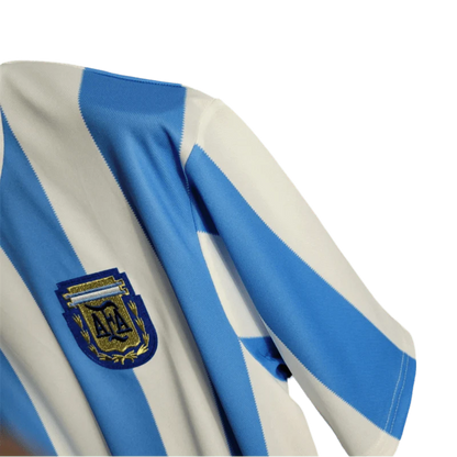 https://cdn.shopify.com/s/files/1/0826/7228/8075/files/1986-argentina-world-cup-home-retro-kit-classickits433-157643.webp?v=1741198801