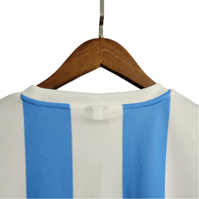 https://cdn.shopify.com/s/files/1/0826/7228/8075/files/1986-argentina-world-cup-home-retro-kit-classickits433-758179.webp?v=1741198801