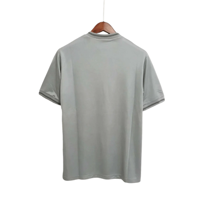 https://cdn.shopify.com/s/files/1/0826/7228/8075/files/19861987-newcastle-utd-grey-away-retro-kit-classickits433-978776.webp?v=1741197847
