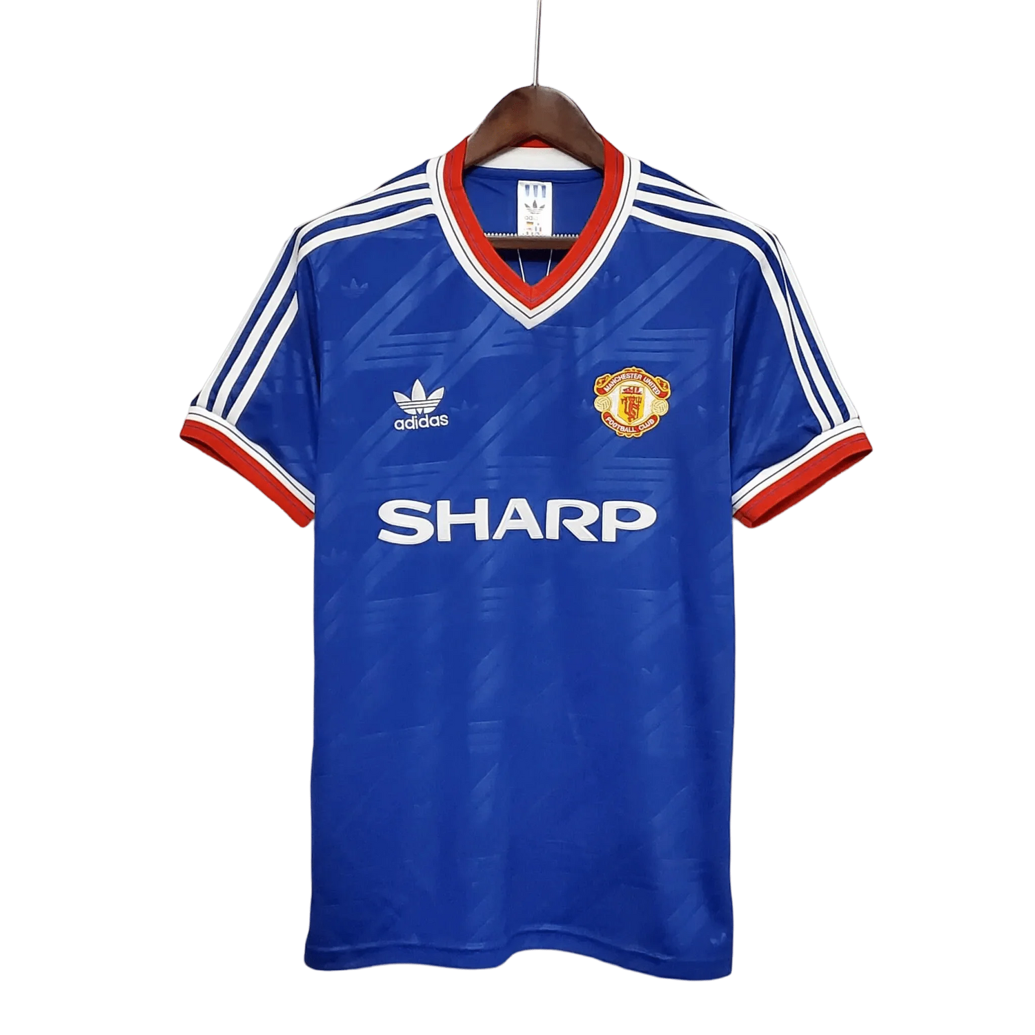 https://cdn.shopify.com/s/files/1/0826/7228/8075/files/19861988-manchester-united-sharp-away-retro-kit-classickits433-391610.webp?v=1741197673