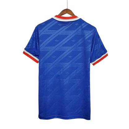 https://cdn.shopify.com/s/files/1/0826/7228/8075/files/19861988-manchester-united-sharp-away-retro-kit-classickits433-590705.webp?v=1741197673