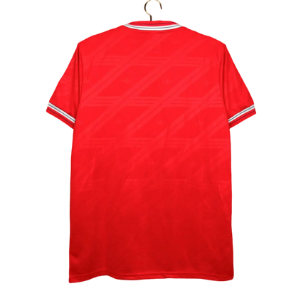 https://cdn.shopify.com/s/files/1/0826/7228/8075/files/19861988-manchester-united-sharp-home-retro-kit-classickits433-582980.webp?v=1741197616