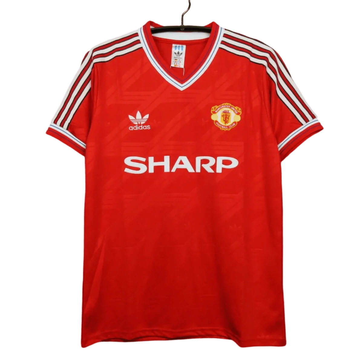 https://cdn.shopify.com/s/files/1/0826/7228/8075/files/19861988-manchester-united-sharp-home-retro-kit-classickits433-635440.webp?v=1741197616