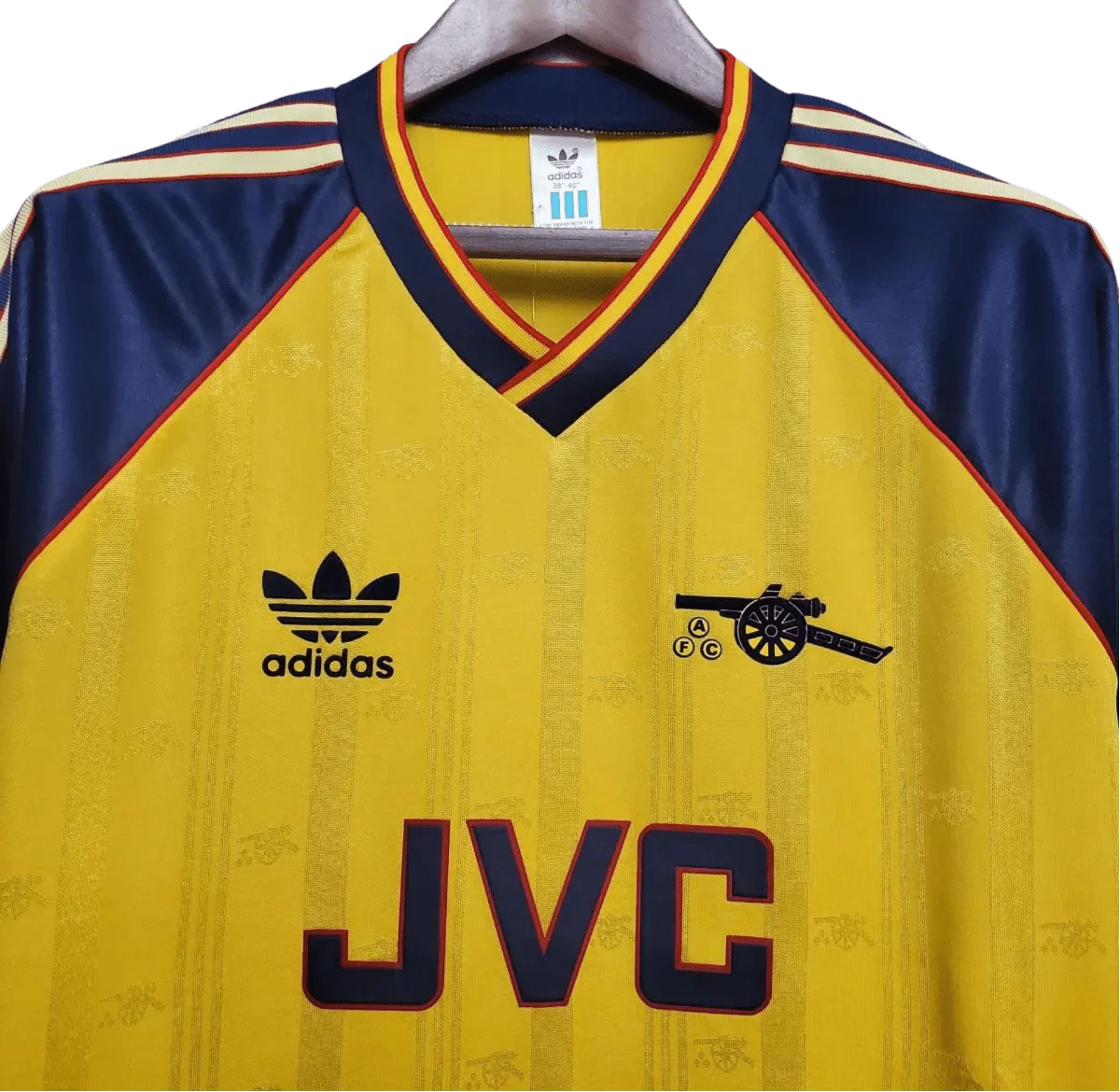 https://cdn.shopify.com/s/files/1/0826/7228/8075/files/19881989-arsenal-jvc-yellow-away-retro-kit-classickits433-390996.webp?v=1741199333
