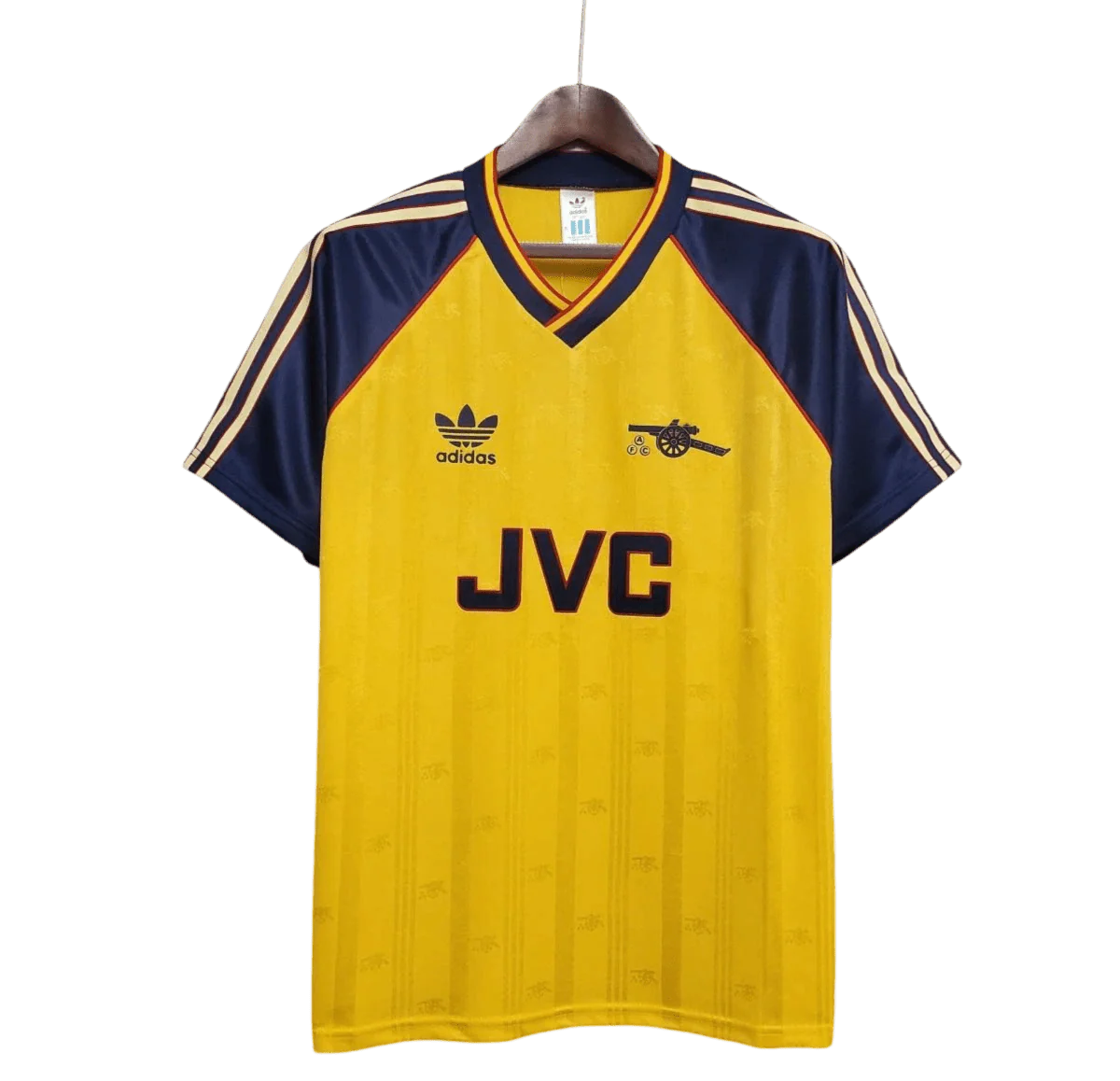 https://cdn.shopify.com/s/files/1/0826/7228/8075/files/19881989-arsenal-jvc-yellow-away-retro-kit-classickits433-632868.webp?v=1741199335