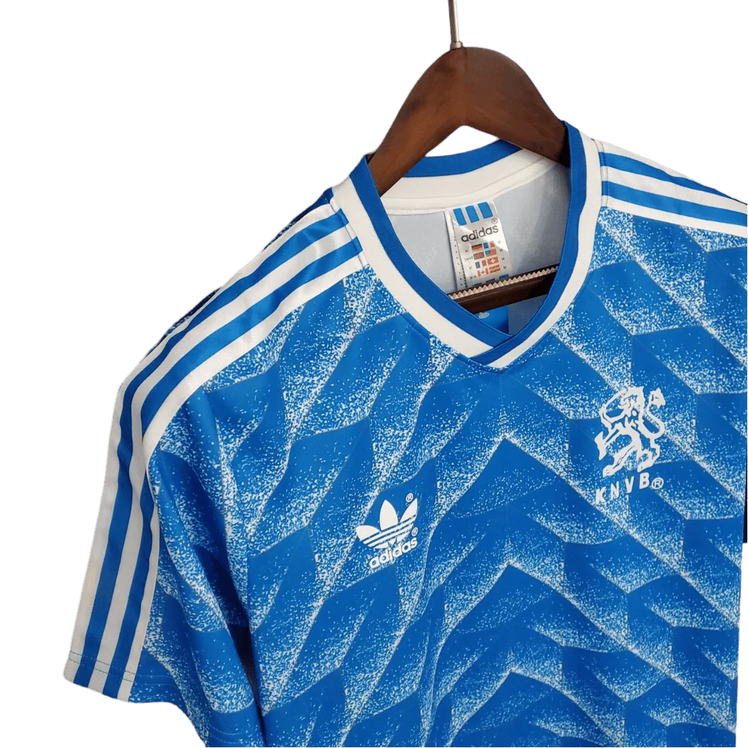 https://cdn.shopify.com/s/files/1/0826/7228/8075/files/19881989-netherlands-euro-away-retro-kit-classickits433-378711.webp?v=1741198792