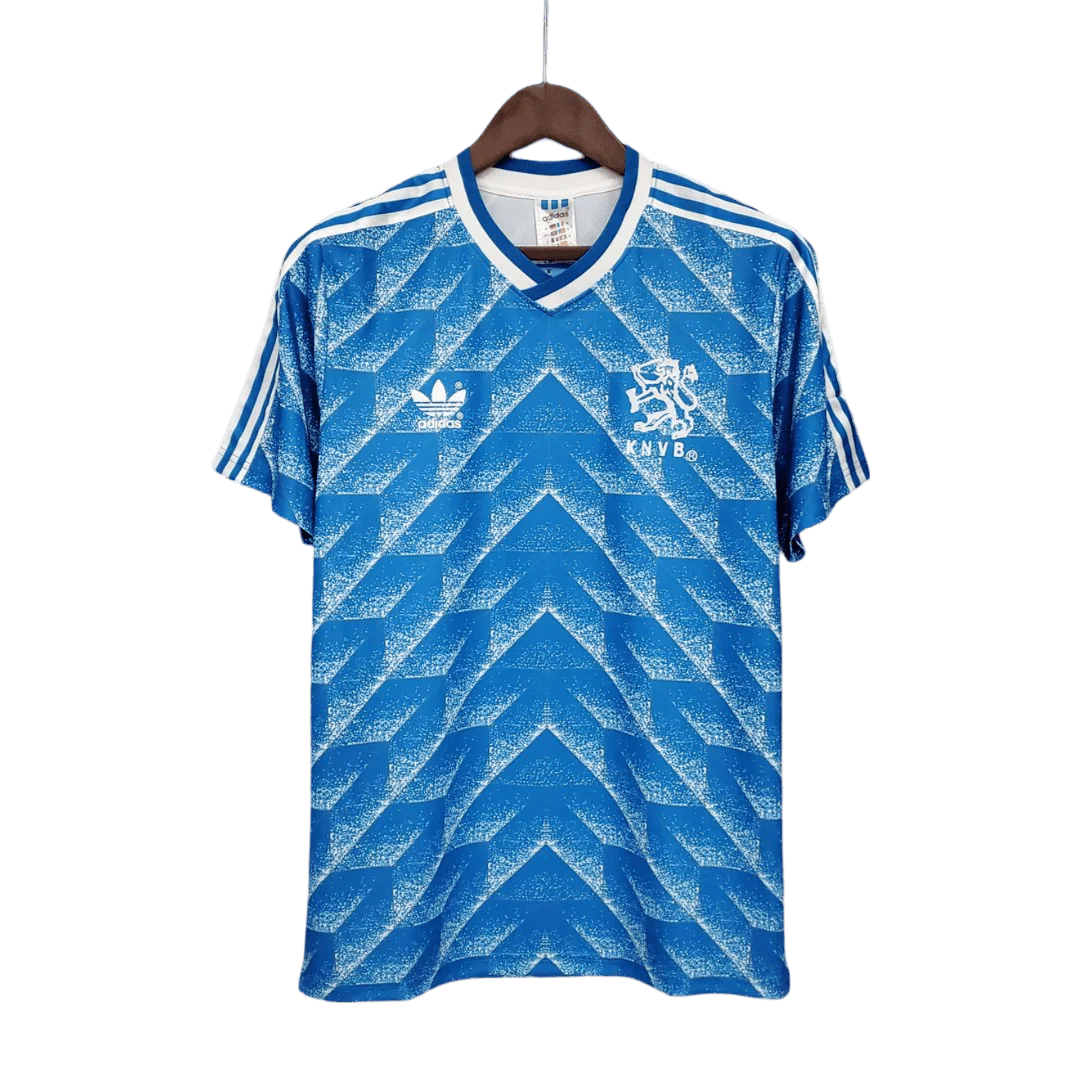 https://cdn.shopify.com/s/files/1/0826/7228/8075/files/19881989-netherlands-euro-away-retro-kit-classickits433-520258.webp?v=1741198793
