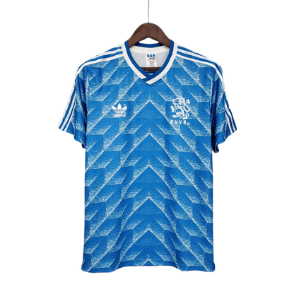 https://cdn.shopify.com/s/files/1/0826/7228/8075/files/19881989-netherlands-euro-away-retro-kit-classickits433-520258.webp?v=1741198793