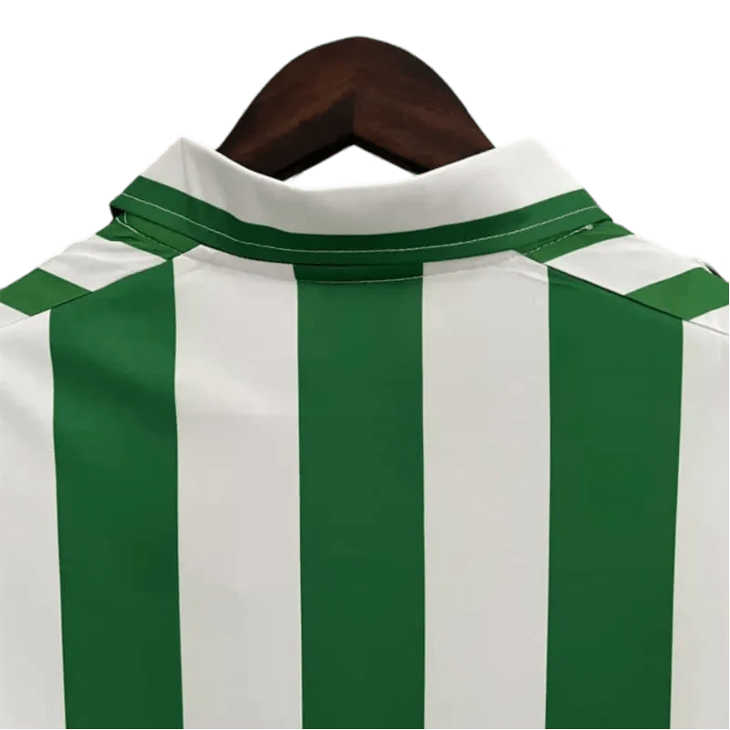 https://cdn.shopify.com/s/files/1/0826/7228/8075/files/19881989-real-betis-expo92-home-kit-classickits433-271568.webp?v=1741198299