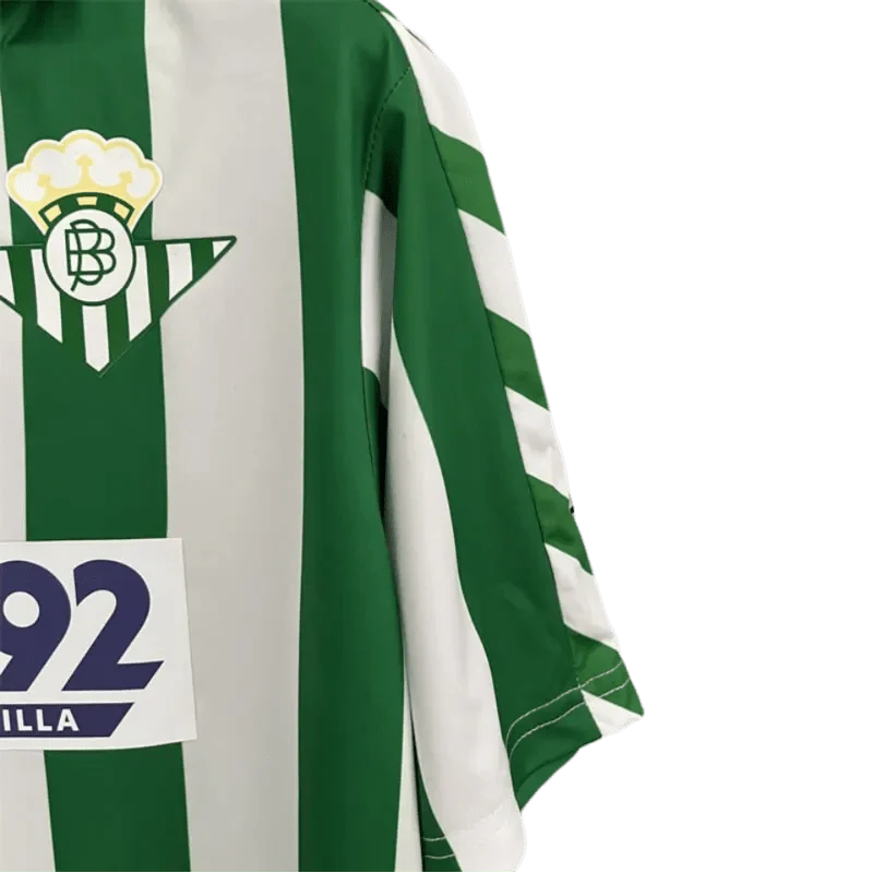 https://cdn.shopify.com/s/files/1/0826/7228/8075/files/19881989-real-betis-expo92-home-kit-classickits433-562994.webp?v=1741198297