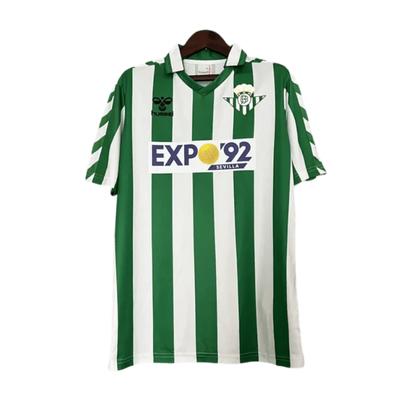 https://cdn.shopify.com/s/files/1/0826/7228/8075/files/19881989-real-betis-expo92-home-kit-classickits433-974558.webp?v=1741198300