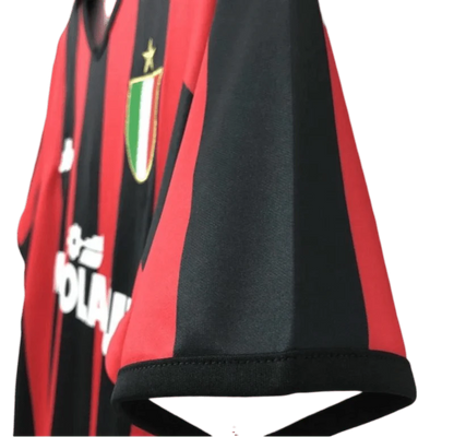 https://cdn.shopify.com/s/files/1/0826/7228/8075/files/19881990-ac-milan-mediolanum-home-retro-kit-classickits433-349630.webp?v=1741198795