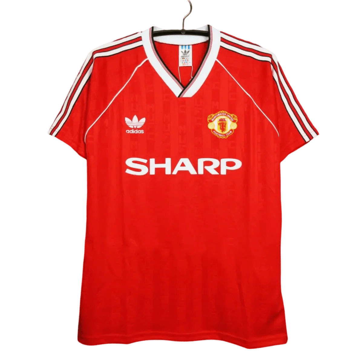https://cdn.shopify.com/s/files/1/0826/7228/8075/files/19881990-manchester-united-sharp-home-retro-kit-classickits433-998198.webp?v=1741197622